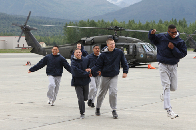 AMYA Cadets from Class 2013-02 disembark with smiles after an Incentive Ride on a Alaska National Guard Blackhawk helicopter.
